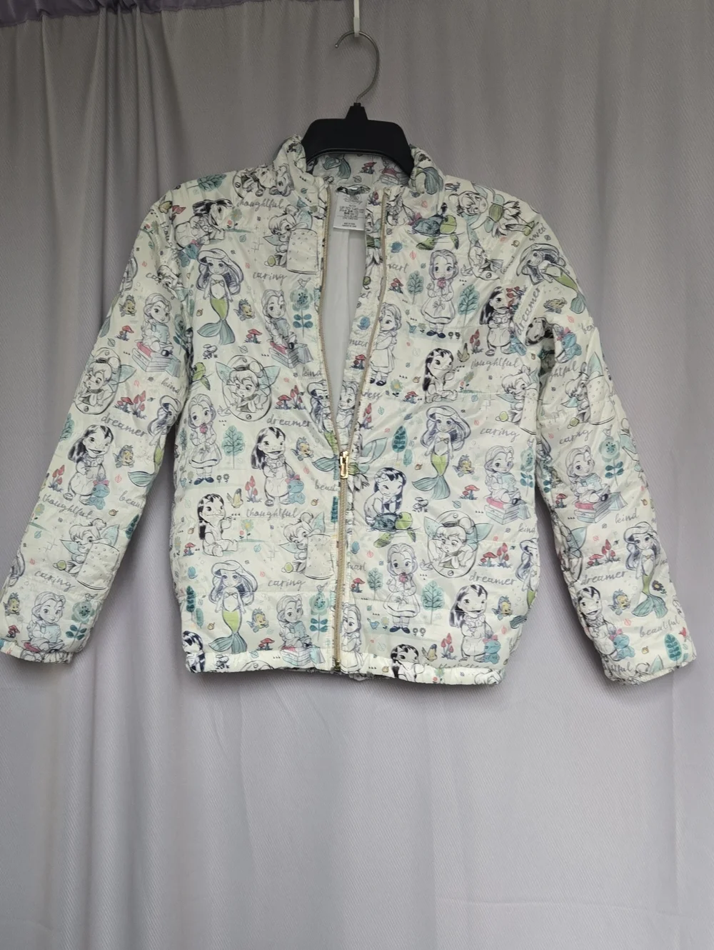 Disney Quilted Puffer Jacket with Cream Background and Pastel Accents